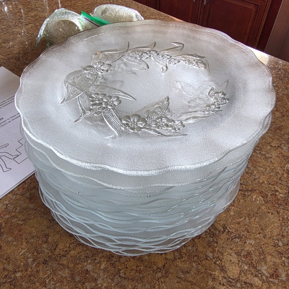 These vintage Mikasa Season's Greetings glass plates feature a festive wreath